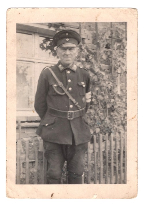 Man Wearing "Im Dienst der Deutschen Wehrmacht" Armband Photo