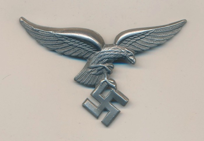 SOLD - Early Luftwaffe Droop Tail Visor Cap Insignia