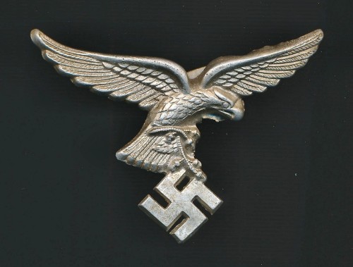 SOLD - Early Luftwaffe Droop Tail Visor Cap Insignia