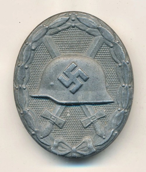 SOLD - Gold Wound Badge