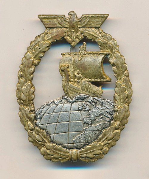 SOLD - Kriegsmarine Auxiliary Cruiser Badge in Tombak by Juncker