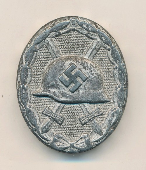 SOLD - L/13 Marked Silver Wound Badge