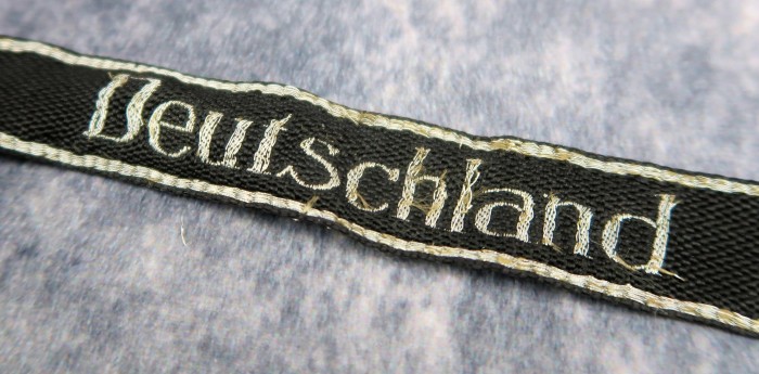 SOLD - Latin script SS officer's flat wire Deutschland Regiment cuff title