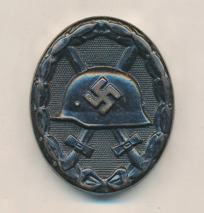 SOLD - Maker Marked Black Wound Badge