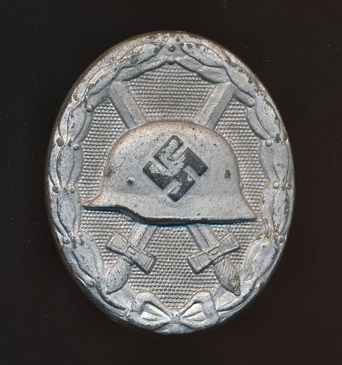 SOLD - Maker Marked Silver Wound Badge