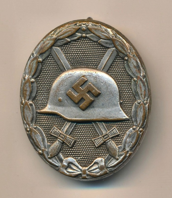 SOLD - Maker Marked Silver Wound Badge in Tombak