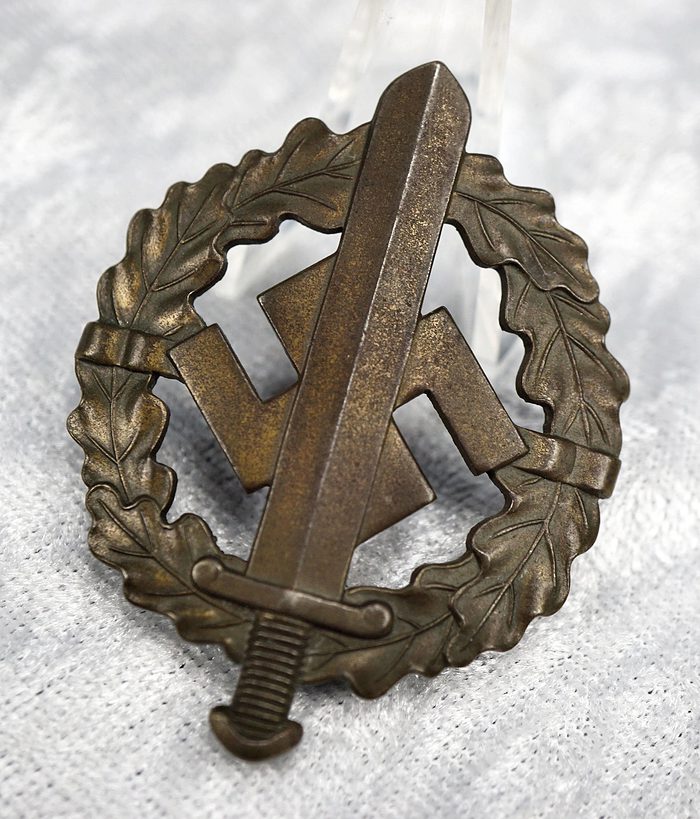 SOLD - numbered SA sports badge in bronze