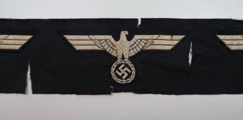 SOLD - strip of 3 uncut Panzer breast eagles