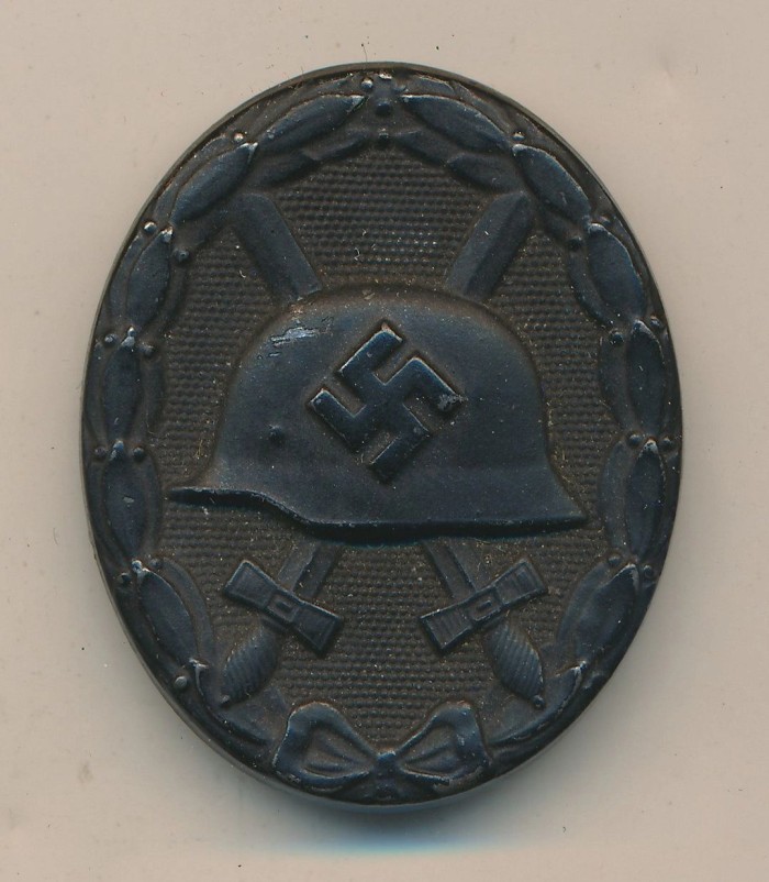 SOLD - Maker Marked Black Wound Badge