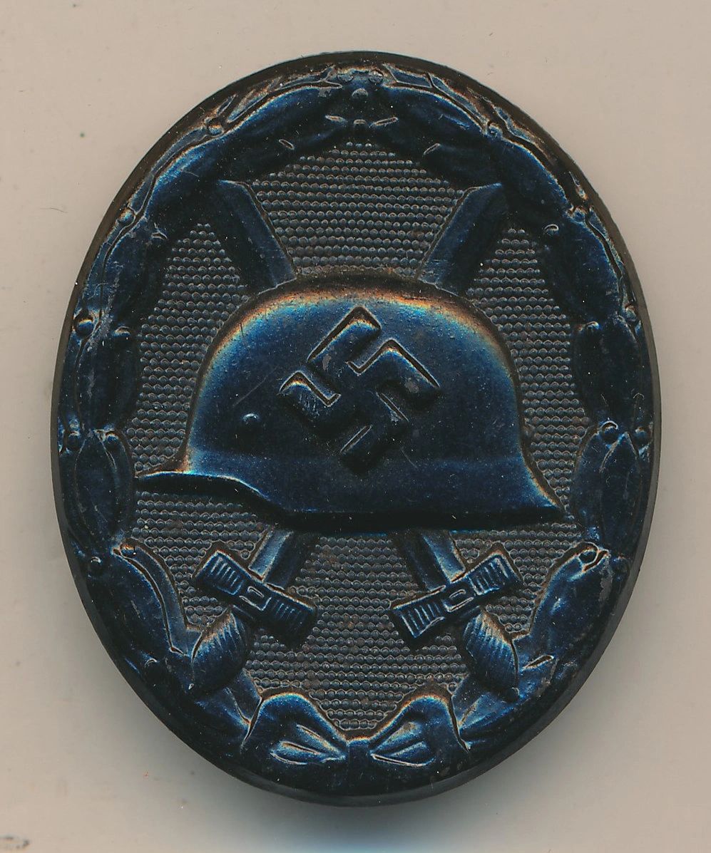 SOLD - Maker Marked Black Wound Badge