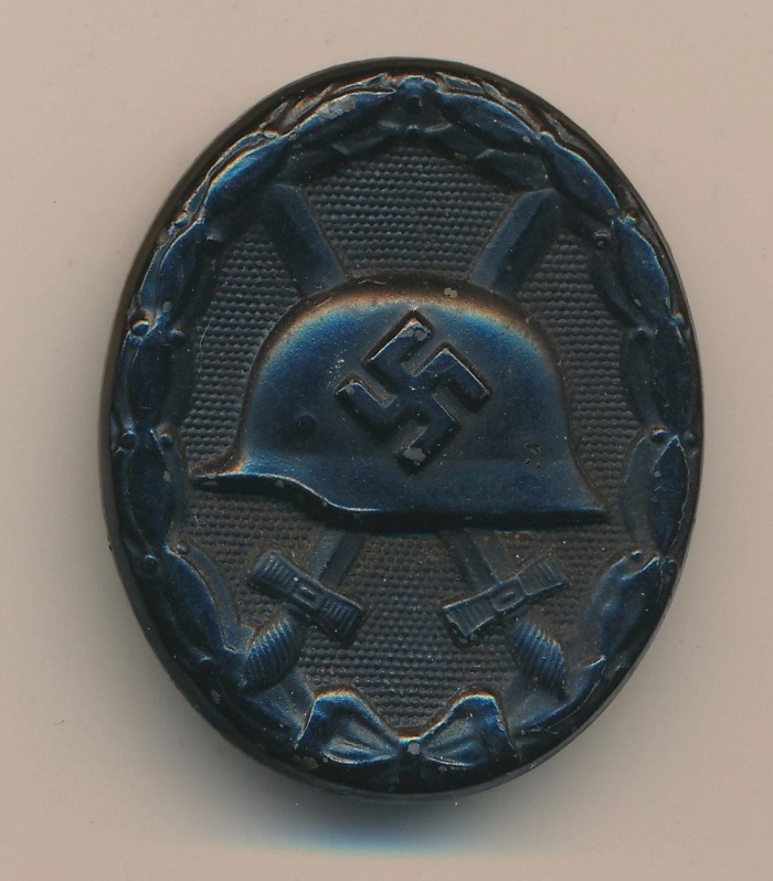 SOLD - Maker Marked Black Wound Badge