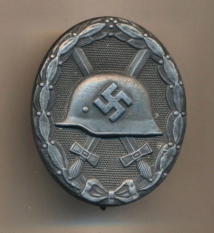 SOLD - Maker Marked Silver Wound Badge