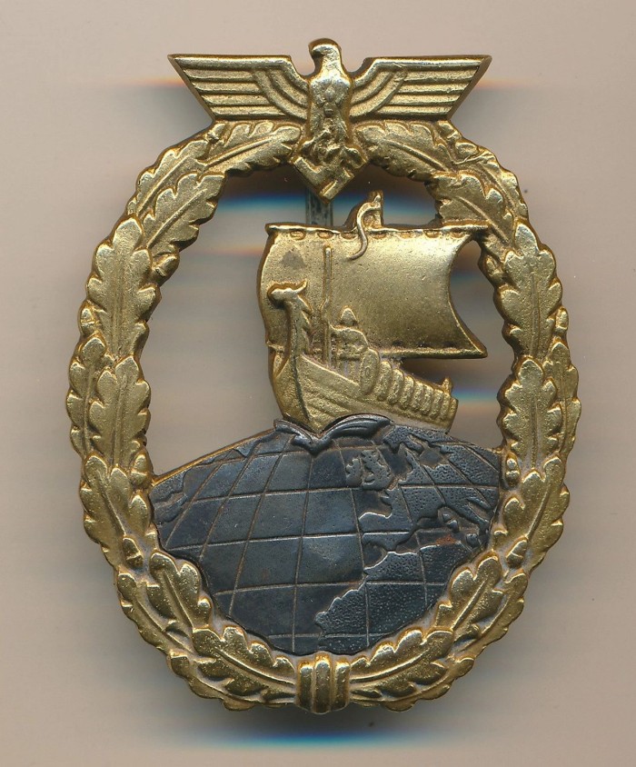 SOLD - Kriegsmarine Auxiliary Cruiser Badge in Tombak by Juncker