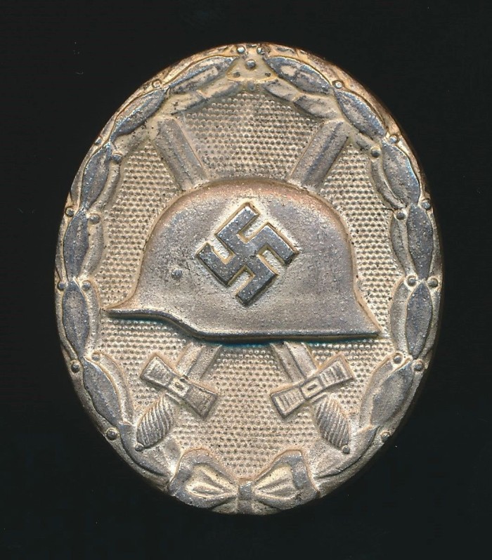 SOLD - Maker Marked Silver Wound Badge